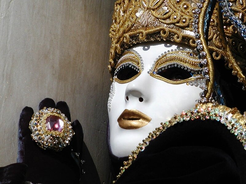 ornate venetian mask and ring