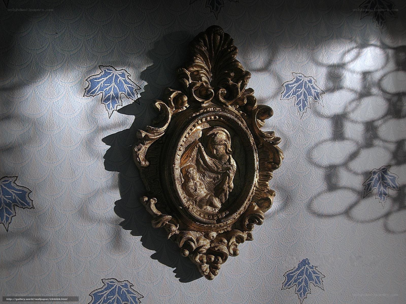 Ornate wall medallion with shadow