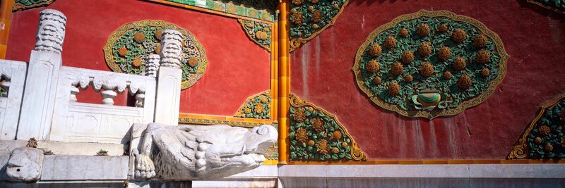 ornate wall with dragon sculpture