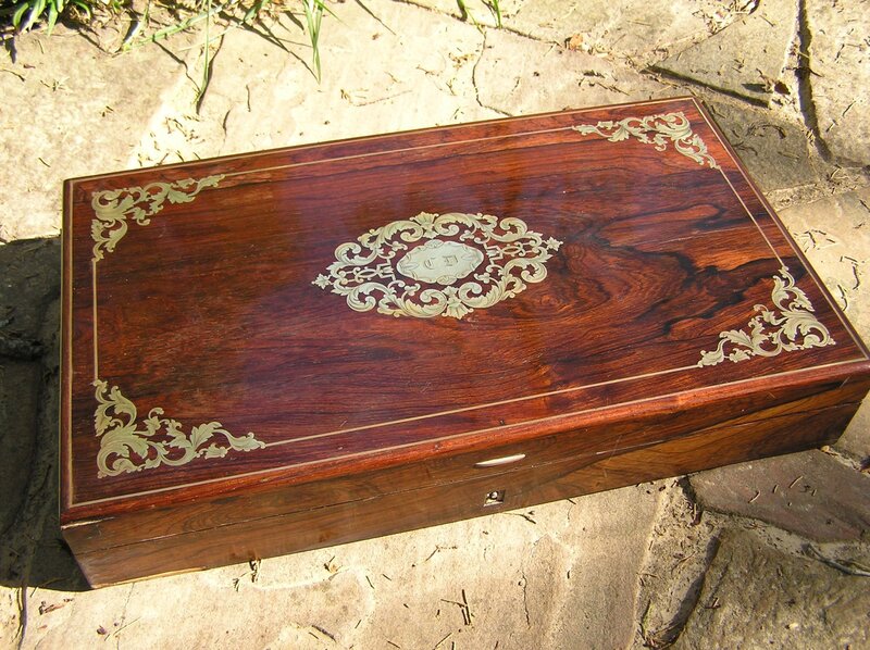 ornate wooden box on stone