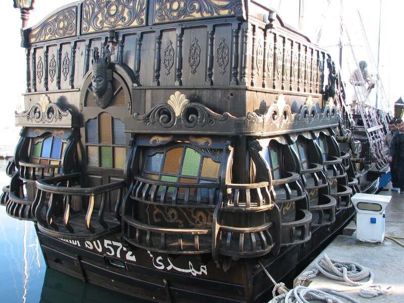 ornate wooden ship at dock