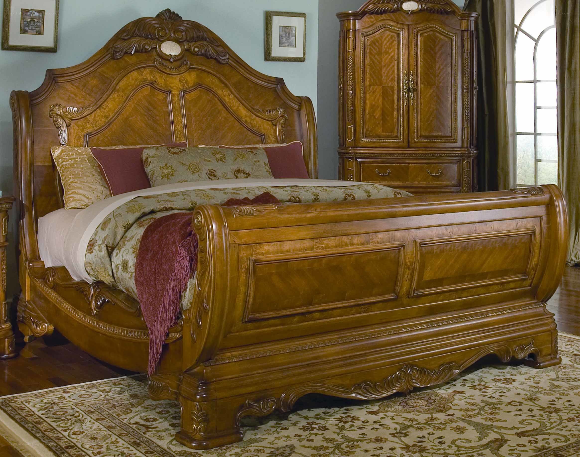 ornate wooden sleigh bed