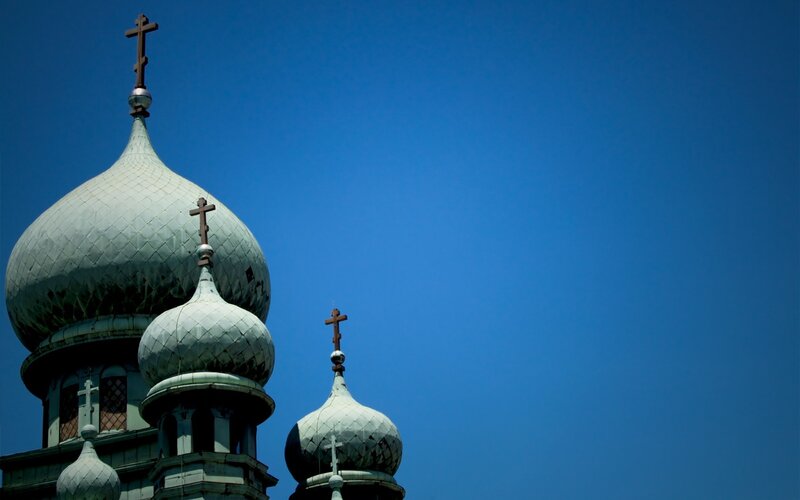 Orthodox church domes against blue sky