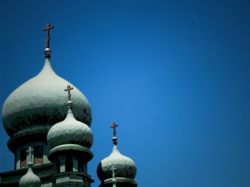 Orthodox church domes against blue sky