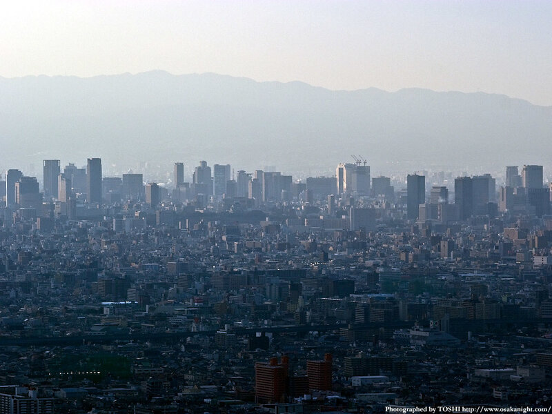 Osaka cityscape with mountains
