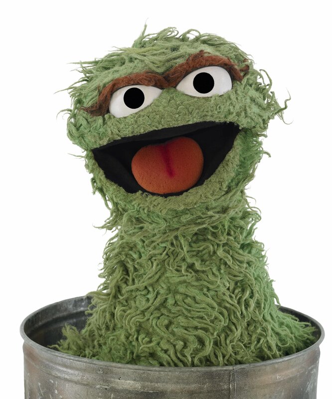 Oscar the Grouch in a trash can