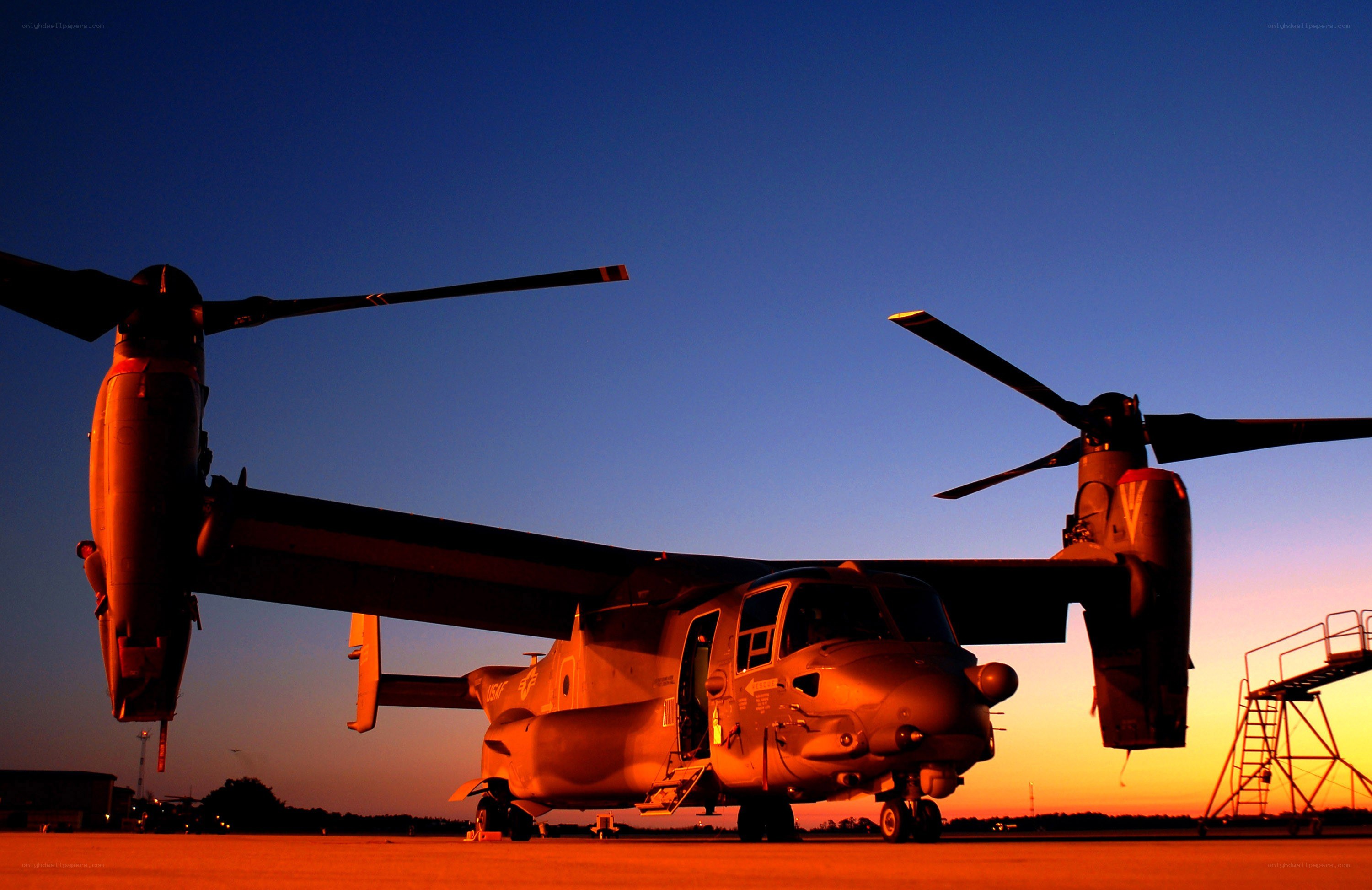 Osprey aircraft at sunset
