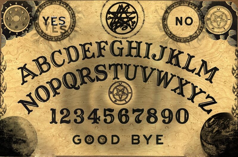 Ouija board with alphabet and symbols
