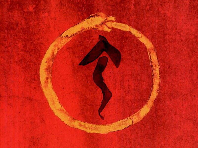 Ouroboros symbol on red background