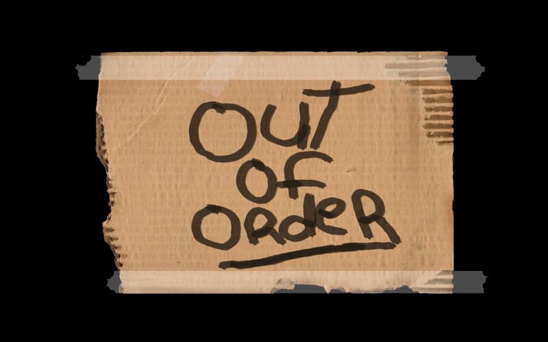 Out of Order sign on cardboard