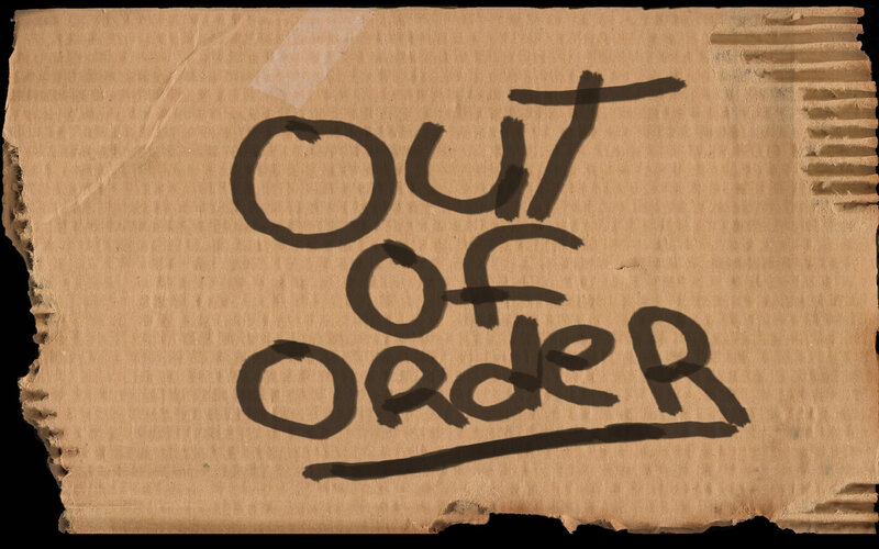 Out of Order sign on cardboard