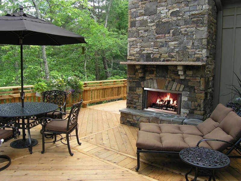Outdoor deck with fireplace