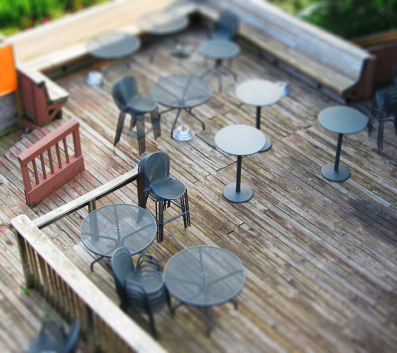 Outdoor deck with tables and chairs