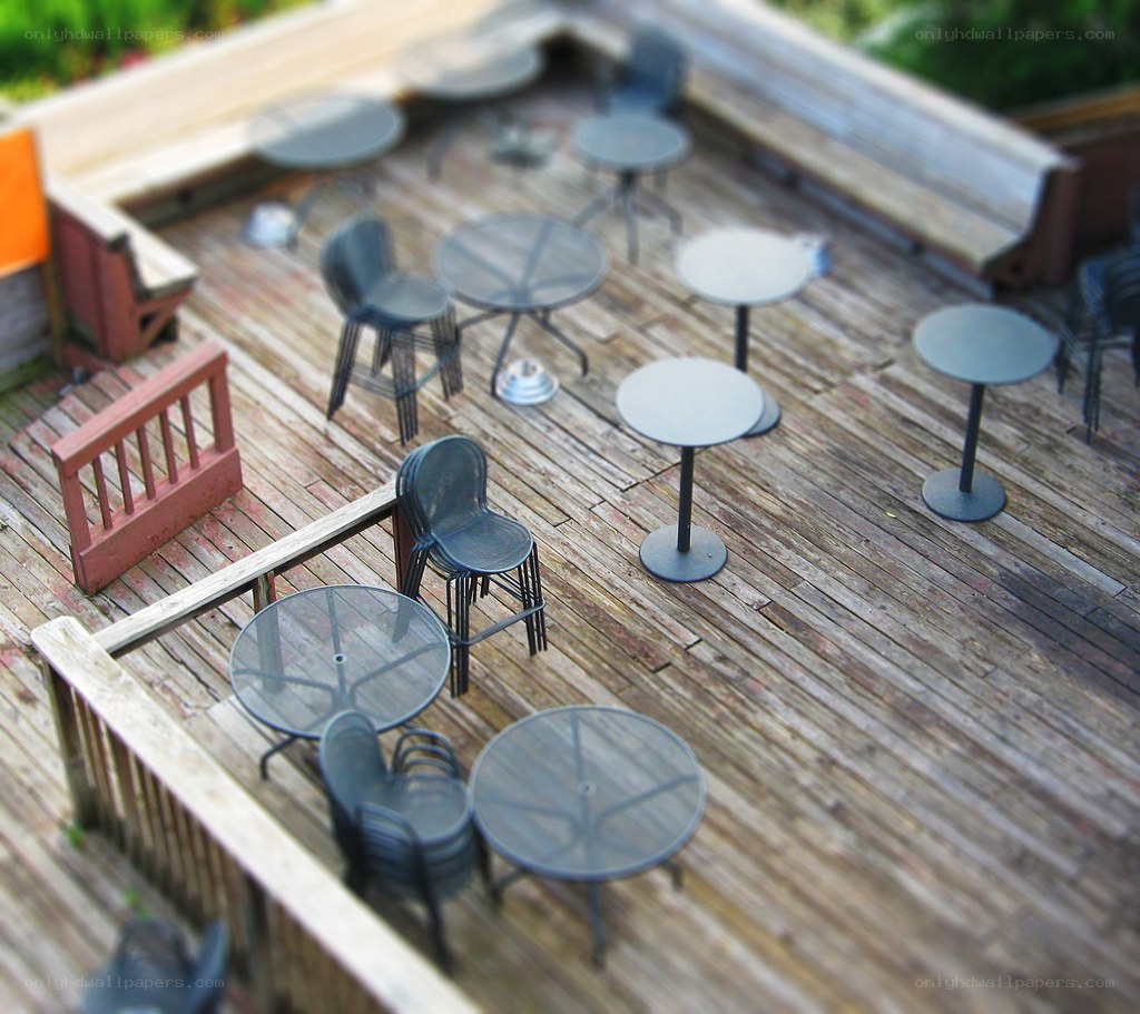 Outdoor deck with tables and chairs
