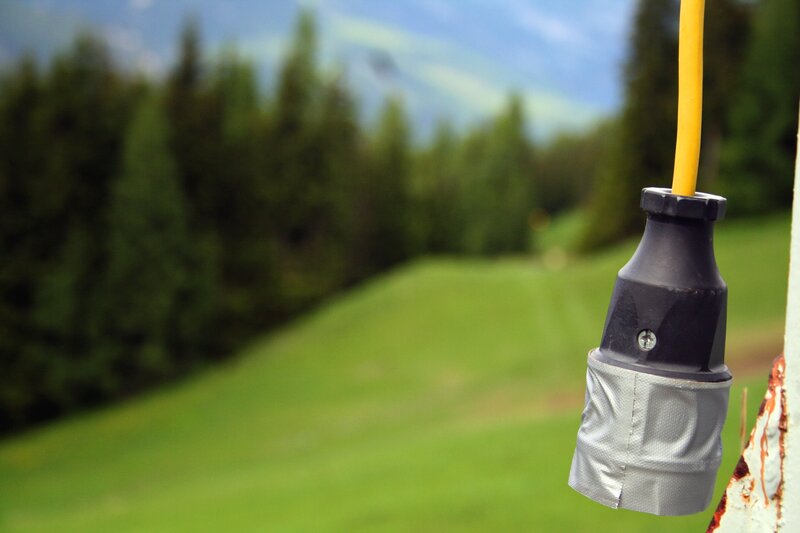 Outdoor electrical plug on a pole