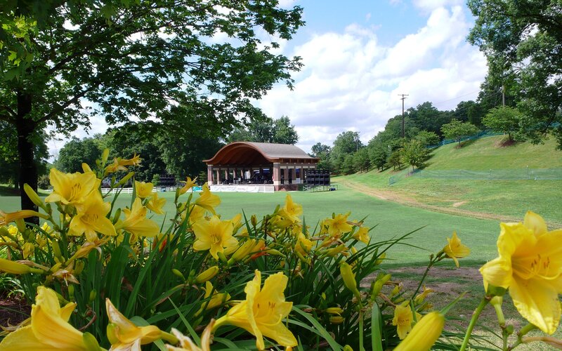 Outdoor stage with yellow flowers