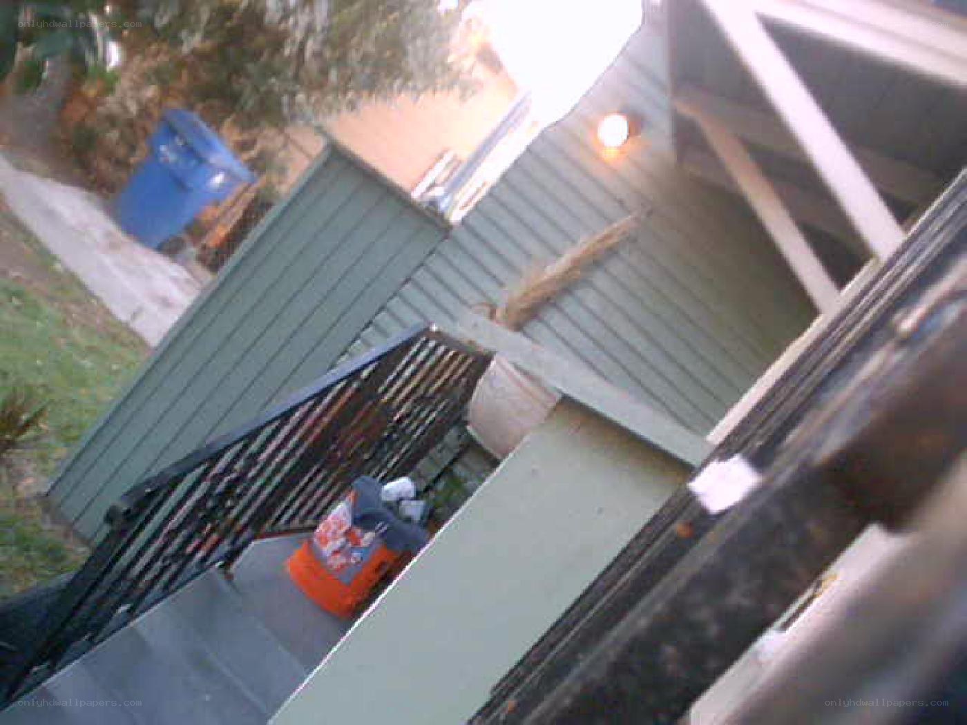 outdoor stairs with trash bin
