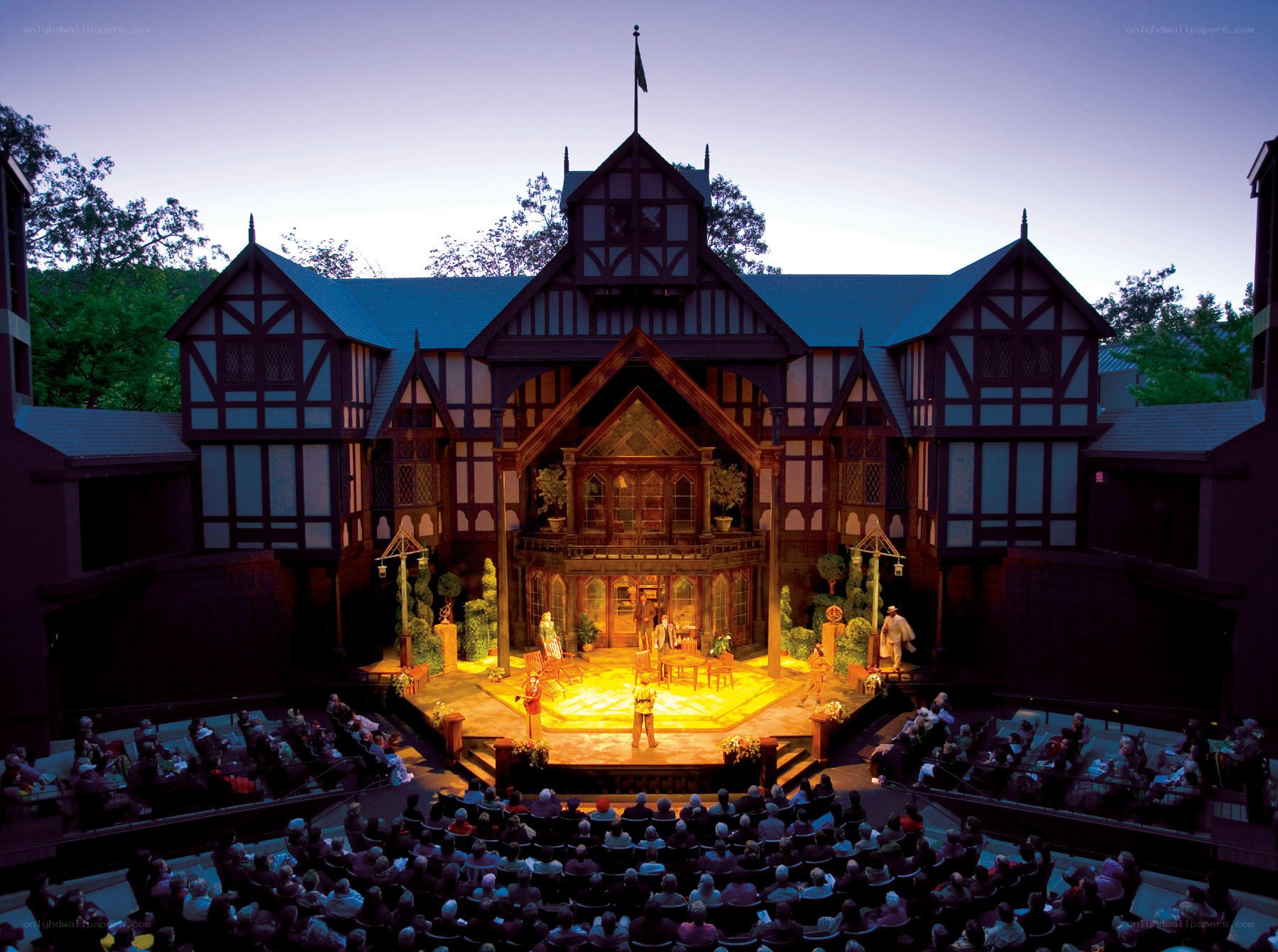 Outdoor theater performance at dusk