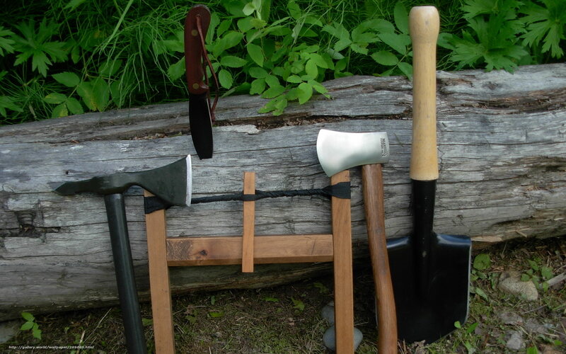 Outdoor tools on a log
