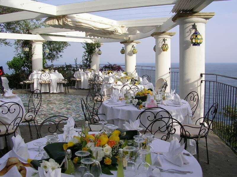 Outdoor wedding reception by the sea