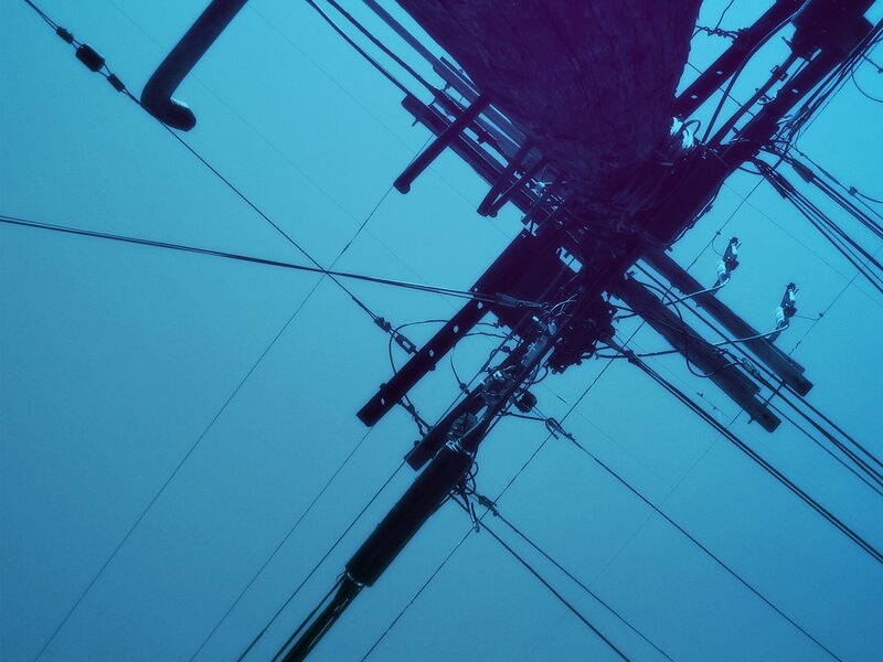 overhead power lines at dusk