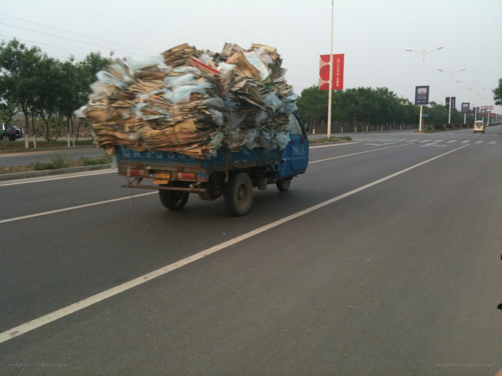 Overloaded truck on road