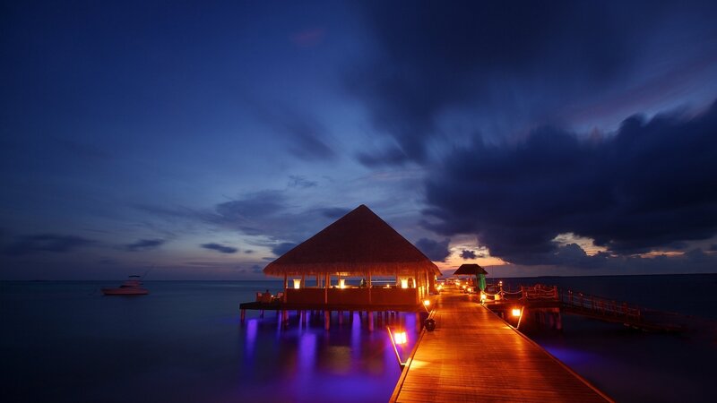 Overwater Bungalow at Dusk — Blue, Serene, Night, Photograph, Pier, Boat