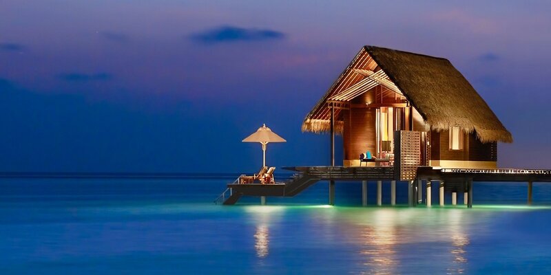 Overwater Bungalow at Night — Blue, Serene, Photograph, Umbrella