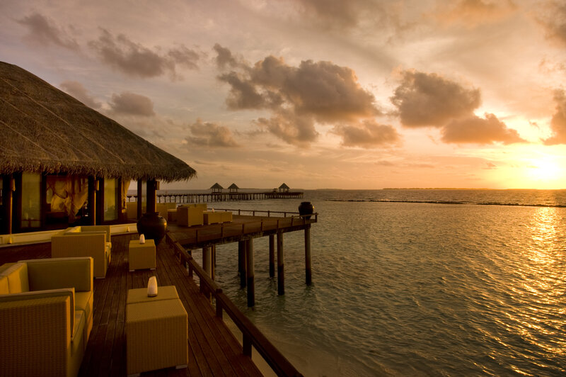 Overwater Bungalow at Sunset — Orange, Serene