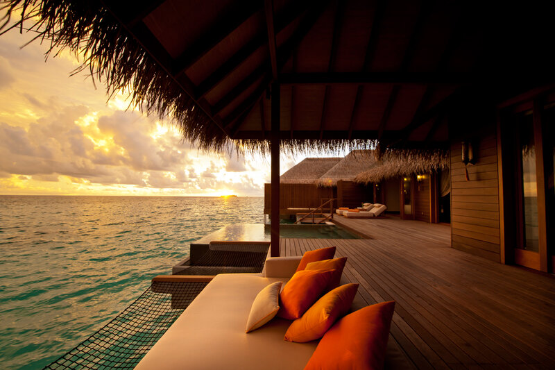 Overwater Bungalow at Sunset — Orange
