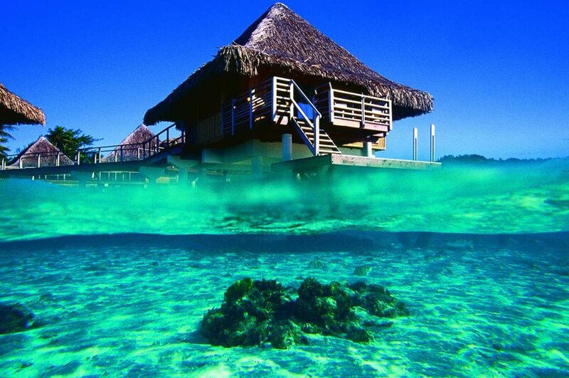 Overwater Bungalow — Blue, Serene, Afternoon, Photograph, Thatched Roof, Coral Reef
