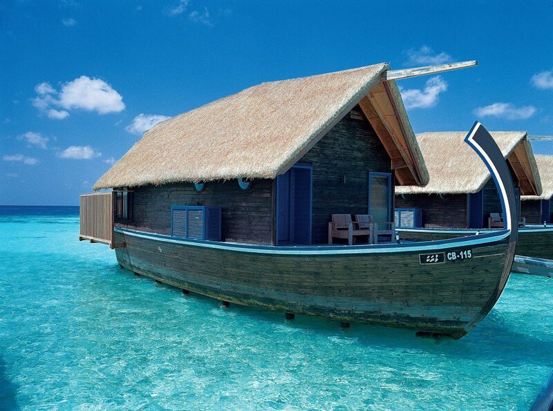 Overwater Bungalow — Blue, Serene, Afternoon, Photograph, Thatched Roof, Ocean