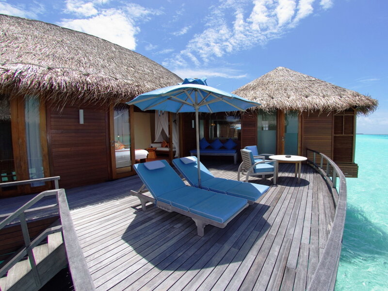 Overwater Bungalow Deck — Blue, Serene, Afternoon, Photograph, Thatched Roof
