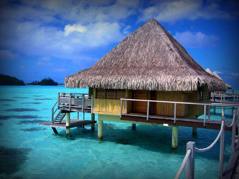 Overwater bungalow in tropical lagoon