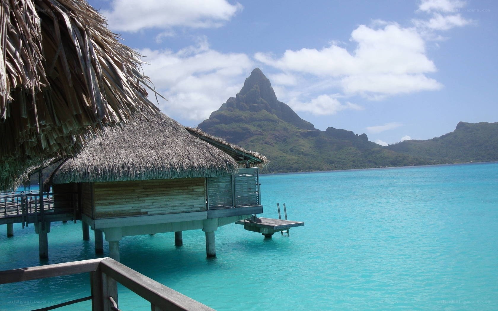 Overwater bungalow with mountain view