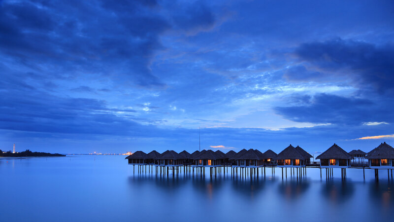 Overwater Bungalows at Dusk — Blue, Serene, Night, Photograph, Water, Sky