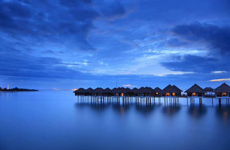 Overwater Bungalows at Dusk — Blue, Serene, Night, Photograph, Water