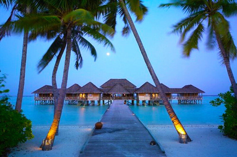 Overwater Bungalows at Dusk — Blue, Serene, Night