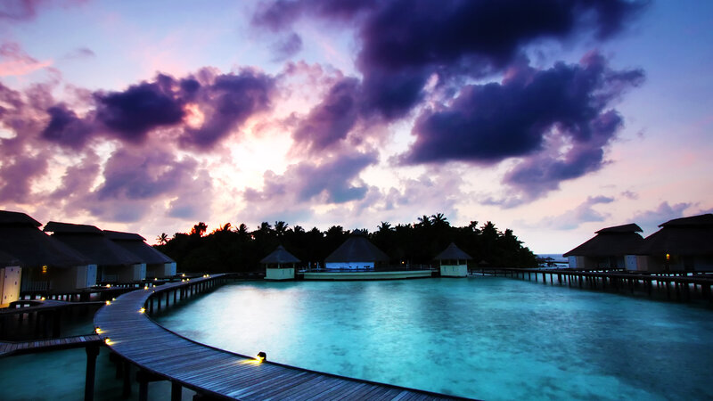 Overwater Bungalows at Dusk — Purple, Dramatic, Sunset