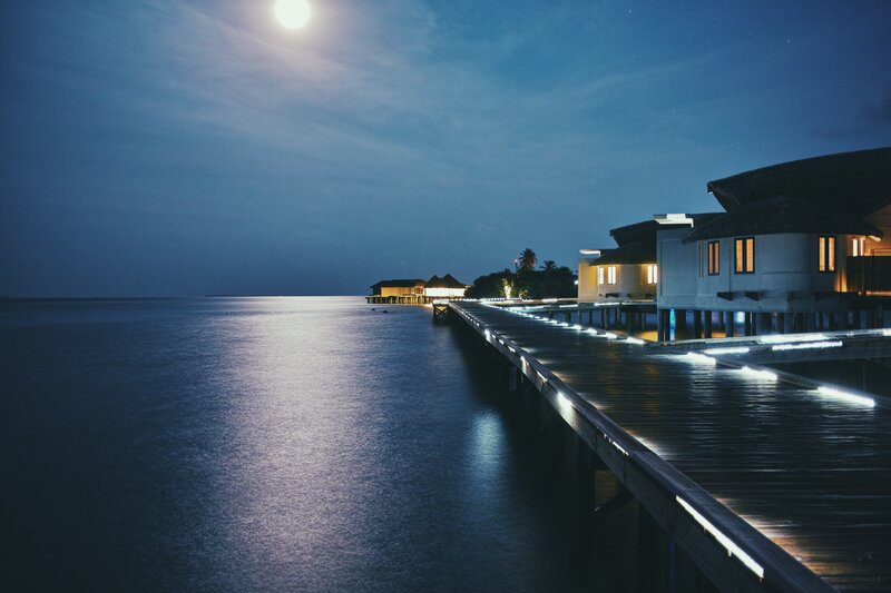 Overwater Bungalows at Night — Blue, Serene, Photograph, Moon, Pier