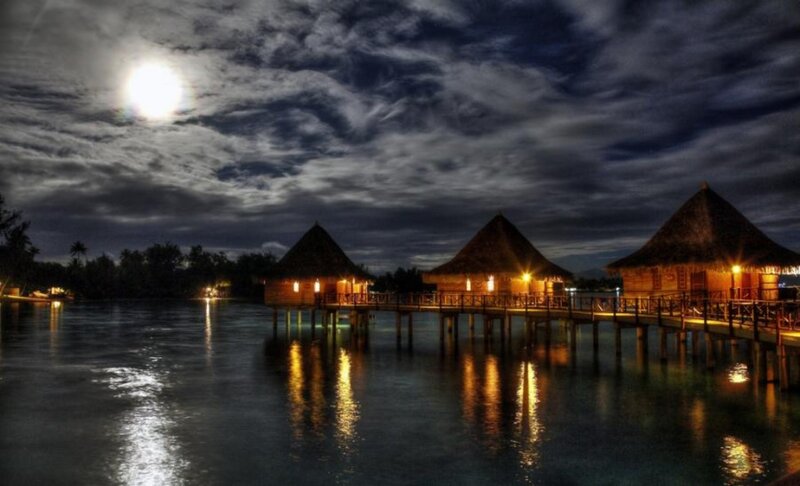 Overwater Bungalows at Night — Dark Blue
