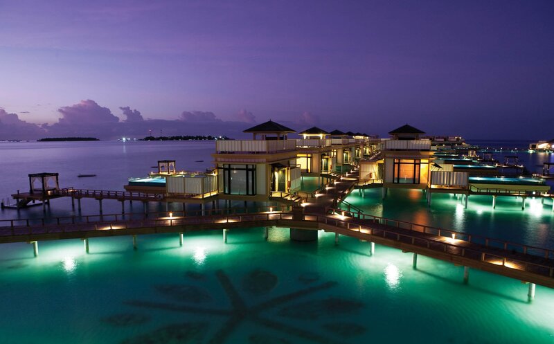 Overwater Bungalows at Night — Purple
