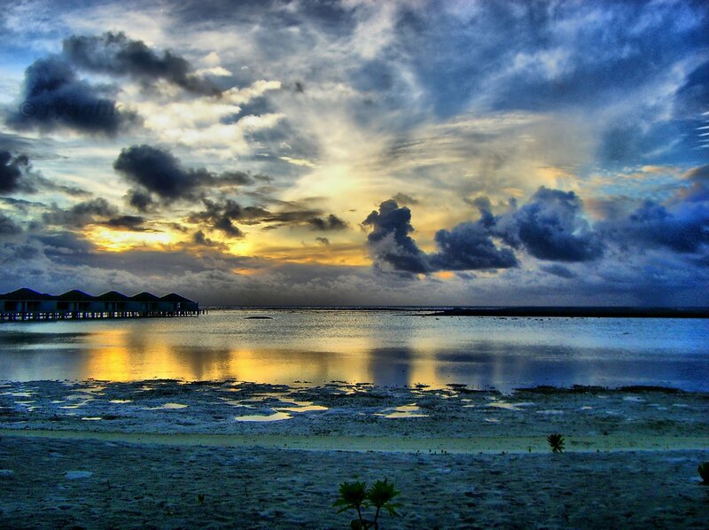 Overwater Bungalows at Sunset — Blue, Dramatic