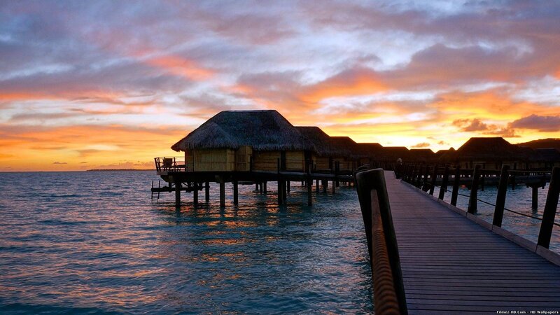 Overwater Bungalows at Sunset — Orange, Serene