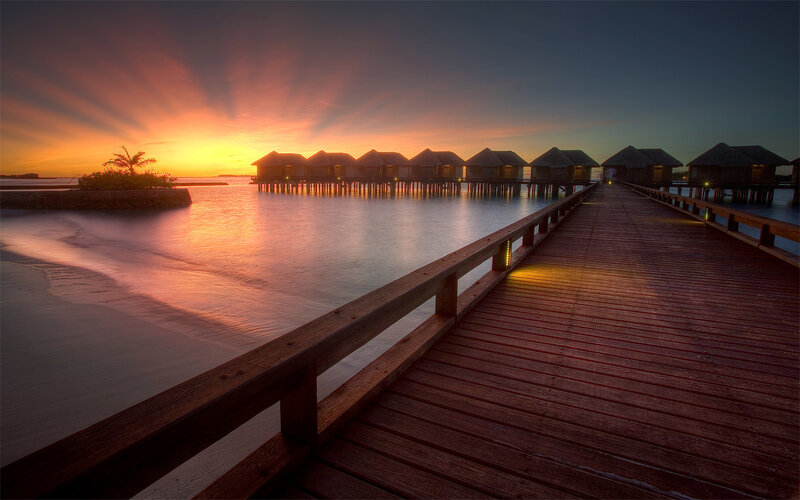 Overwater Bungalows at Sunset — Orange