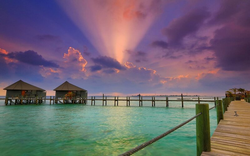 Overwater Bungalows at Sunset — Purple, Dramatic