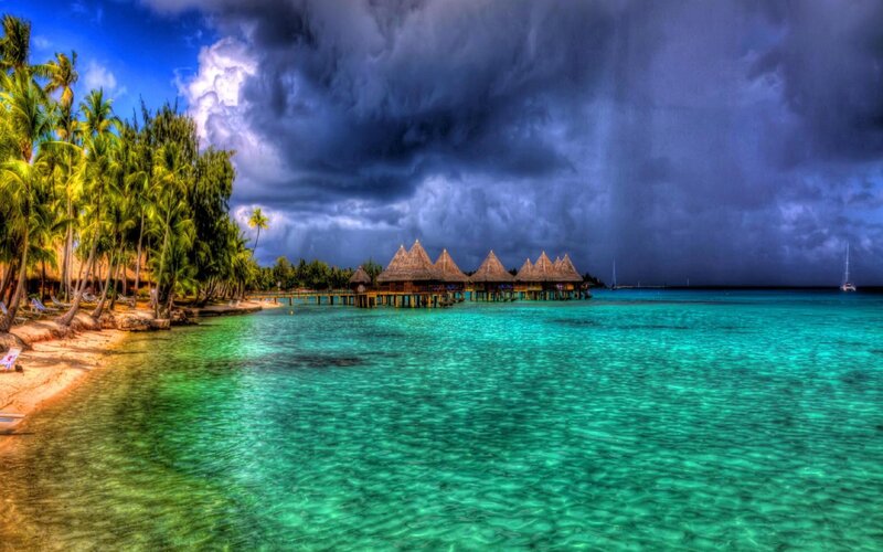 Overwater Bungalows — Blue, Dramatic, Afternoon, Photograph, Palm Trees, Storm Clouds, Sailboat