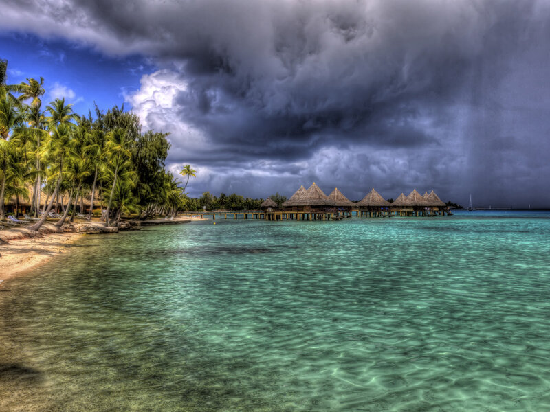 Overwater Bungalows — Blue, Dramatic, Afternoon, Photograph, Palm Trees, Storm Clouds
