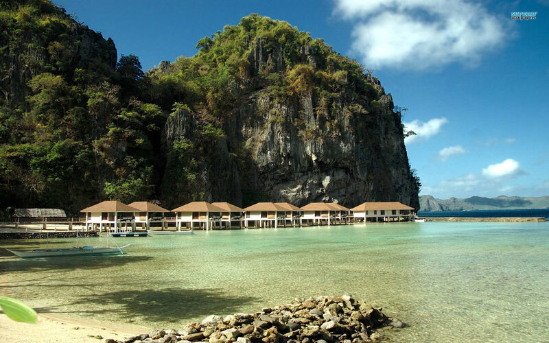 Overwater Bungalows — Blue, Serene, Afternoon, Photograph, Cliffs