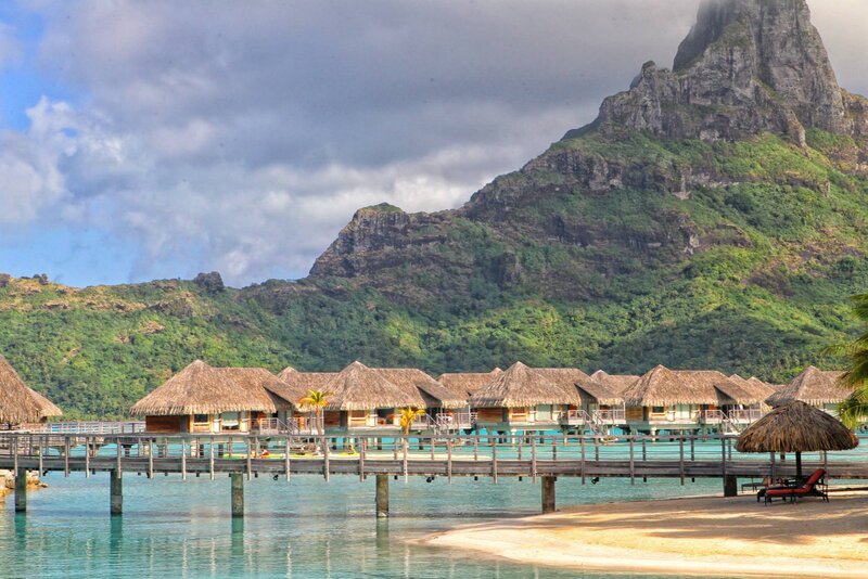 Overwater Bungalows — Blue, Serene, Afternoon, Photograph, Mountain, Beach, Palm Trees
